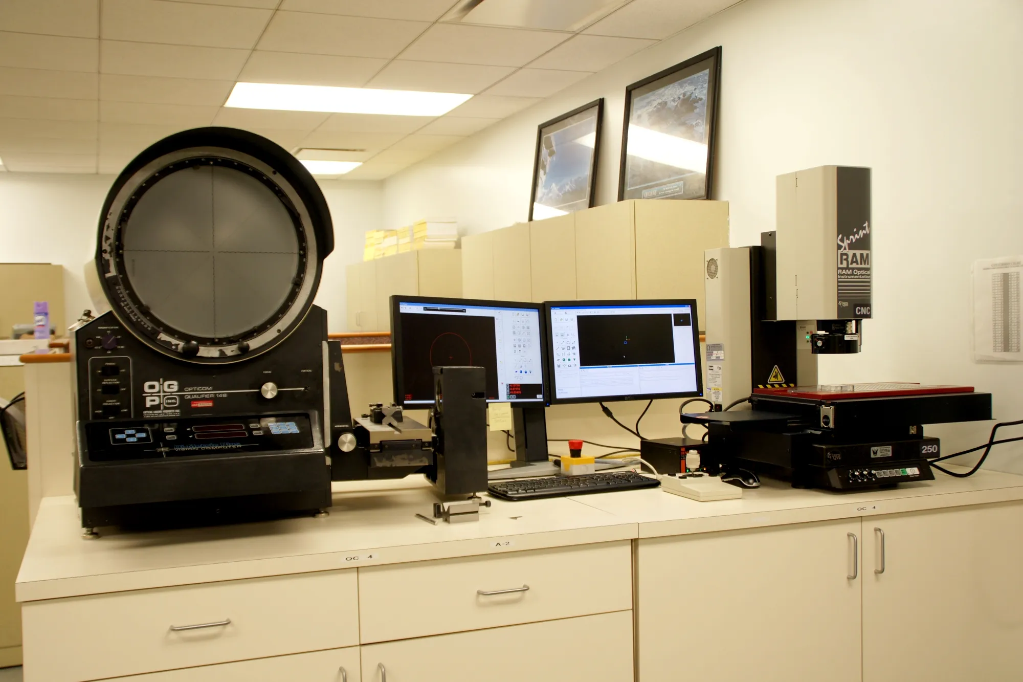 OGP Opticom Qualifier 14B optical comparator and RAM Optical Sprint video measurement system in the inspection room
