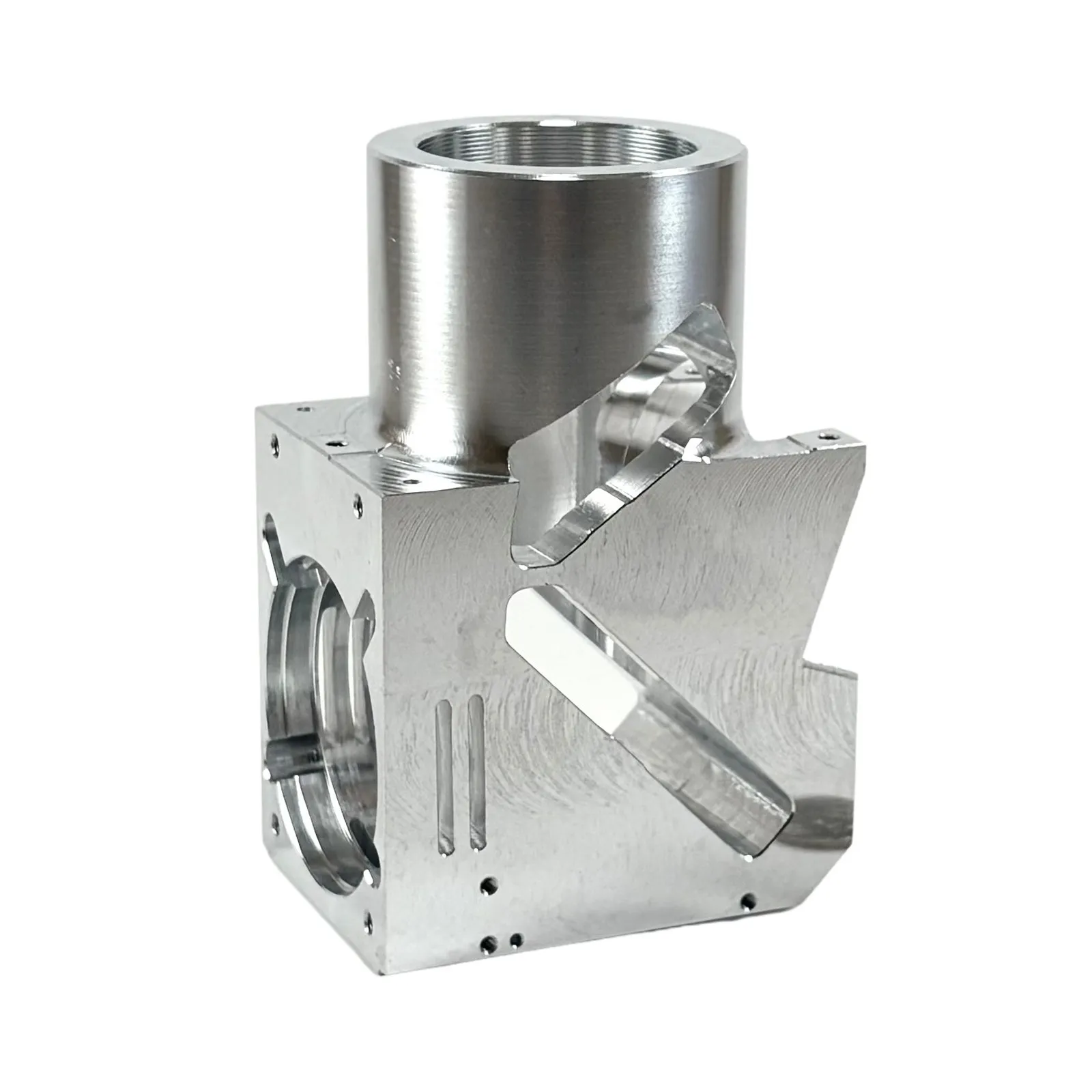 An as-machined aluminum housing with a threaded cylindrical bore, internal pockets, and chamfered faces